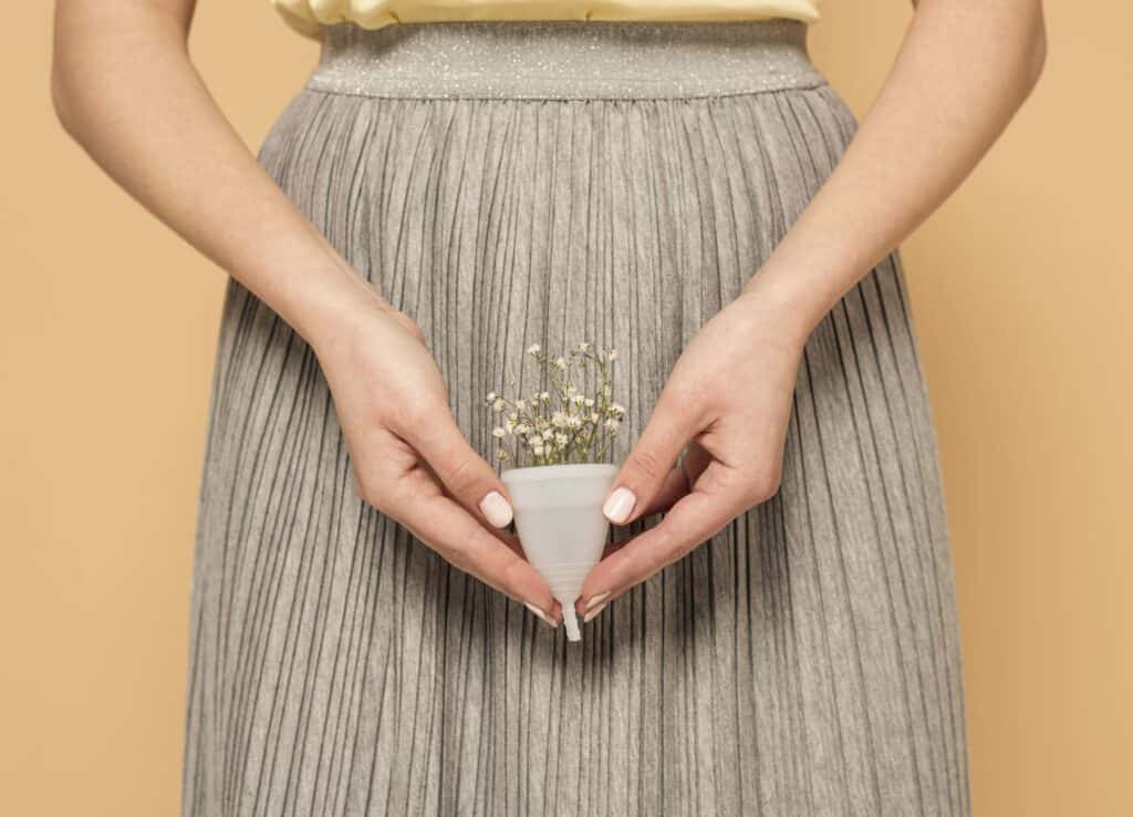 close-up-plastic-cup-with-flowers